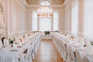 Luxurious wedding table setting. Luxurious wedding hall.
