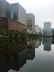 Fototapeta na wymiar Tokyo downtown cityscape reflection in lake