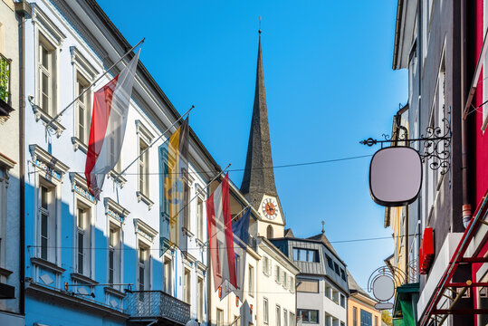 Facades of the city center in Bad Ischl with church tower in background, Salzkammergut, Austria