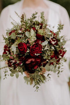 Very beautiful wedding bouquet in hands of the bride

