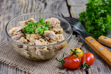 Tuna salad on the wooden background