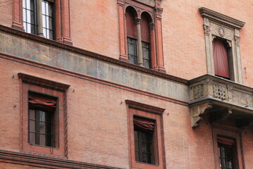 Fototapeta na wymiar old building italian architecture windows and shutters