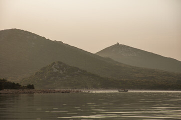 Fishing boat and the sunset on the Adriatic sea