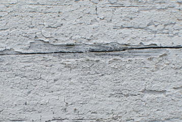 Texture of an old wooden board with a staple. texture background