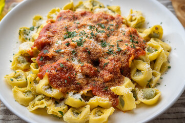 boiled tortellini with tomato sauce