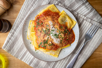beef bolognese ravioli with tomato sauce