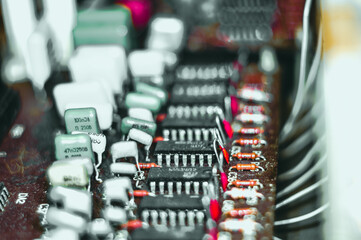 Fototapeta premium Vintage electronic circuit boards with radio parts and chips, close-up, macro photo