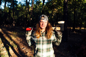 Woman with ax on her shoulders