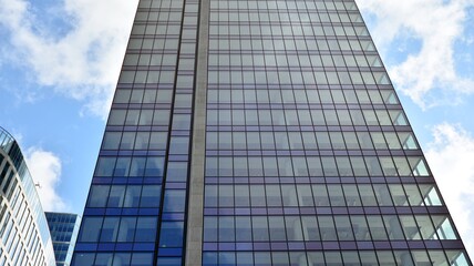 Obraz na płótnie Canvas Bottom view of modern office buildings in the business district