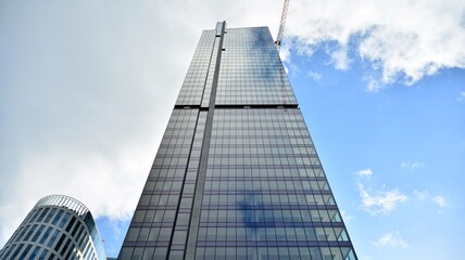 Obraz premium Bottom view of modern office buildings in the business district