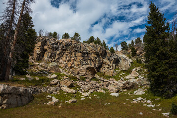 Fototapeta na wymiar Rocks in the mountain meadow