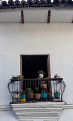 Image of a window in a typical house in the coffee zone in Colombia.