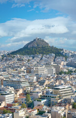 Obraz premium View of Athens and Mount Lycabettus, also known as Lycabettos, Lykabettos or Lykavittos