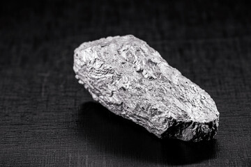 Palladium is a chemical element that at room temperature contracts in the solid state. Metal used in industry. Mineral extraction concept.