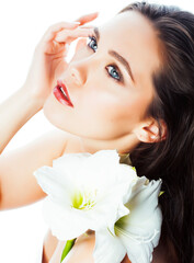 Obraz na płótnie Canvas young pretty woman with Amarilis flower closeup isolated on white macro