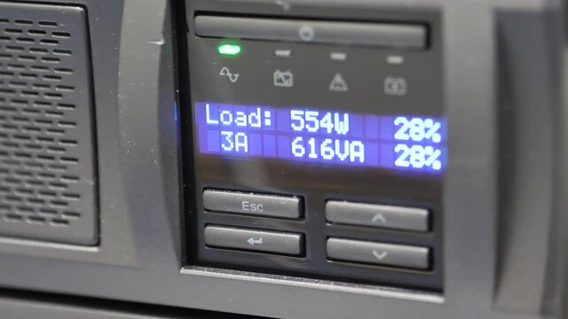Front View Of Two Grey Ups Machines, Emergency Power Source, Backup Battery