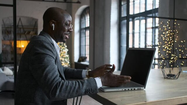 businessman works at home using a laptop, communicates online