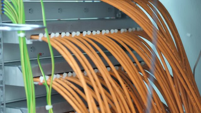 Racks of Well Organized Fibre Optic Wires In A Server Room