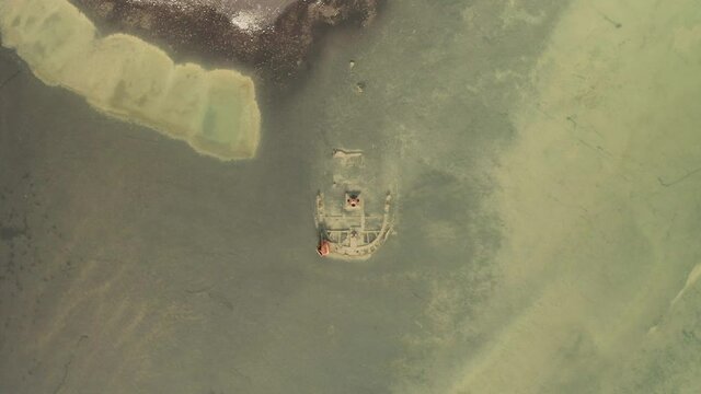 Revealing Top Shot Of FV Clyne Castle Steam Trawler Wreck In Breidamerkursandur, South Coast Of Iceland - aerial drone