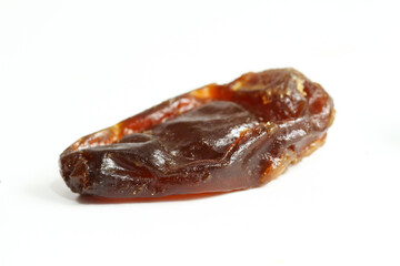 Macro of dehydrated grape fruit on white background