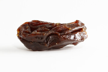 Macro of dehydrated grape fruit on white background