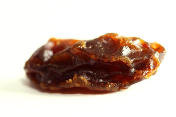 Macro of dehydrated grape fruit on white background