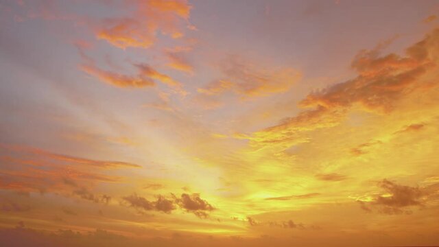 Nature video Time lapse video. Scene of Colorful amazing sunset Golden sky to Red sky Day to Night with Moving clouds background in nature and travel concept.
