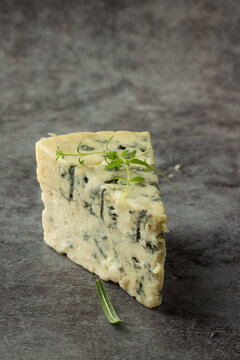 Blue Cheese Close Up On Gray Background.