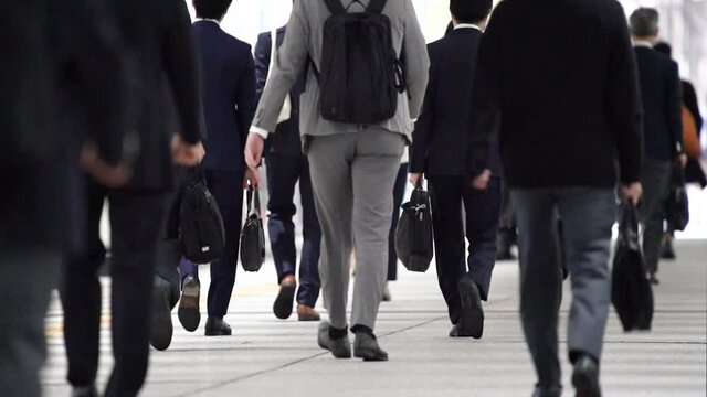 Crowd of businessman walking to work in Tokyo, JAPAN / slow motion (東京都心の通勤風景)