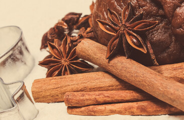 Cookie cutters and spices with dough for gingerbread or festive cookies. Christmas time