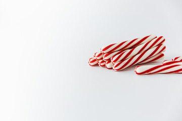 Obraz na płótnie Canvas Peppermint Stick Candy Cane on White Background