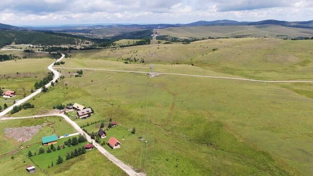 Zlatibor Mountain, Serbia. Aerial View of Green Landscape on Summer Day, Gondola Lift Cables. Beautiful Serbian Nature, Drone Shot