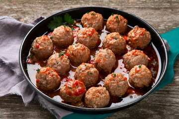 Traditional meatballs in frying pan