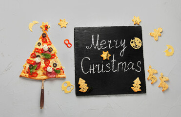 Fototapeta na wymiar Piece of pizza set like christmas tree.