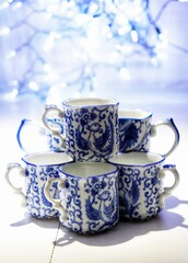 China bone porcelain coffee or tea cups. Blue porcelain mugs.