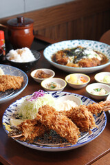 
Japanese deep fried shrimp or tonkatsu set with rice on wooden table