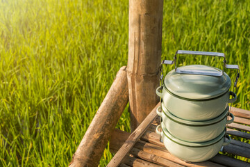 Fototapeta premium Zinc coated food carrier in Thailand countryside, beautiful natural farm atmosphere in the morning