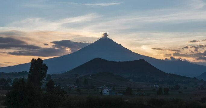 Timelapse of popocatepetl volcano during sunset as seen from cerro zapotecas in Cholula, Mexico