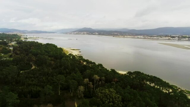 Drone Footage of a River with Mountains in the Background - Dolly Shot 4K