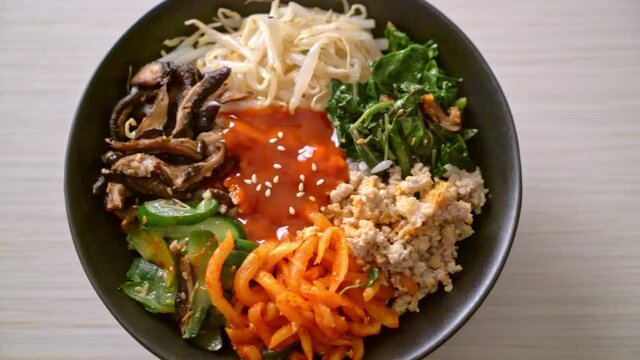 Bibimbap, Korean spicy salad with rice bowl - traditionally Korean food style