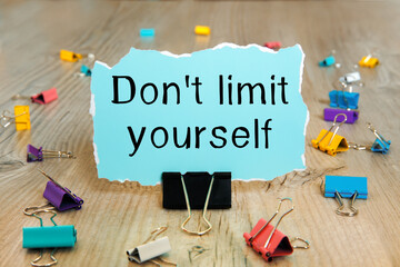 Don't limit yourself - writing on torn paper.