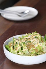 fresh vegetable salad topping crispy bread dressing mayonnaise sauce on plate