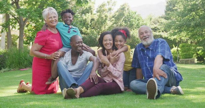  Multi-generation African American family spending time in the garden together