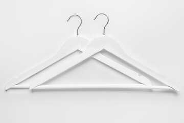 Clothes hangers on white background