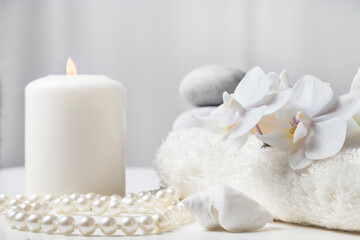 Image with towel and orchid.