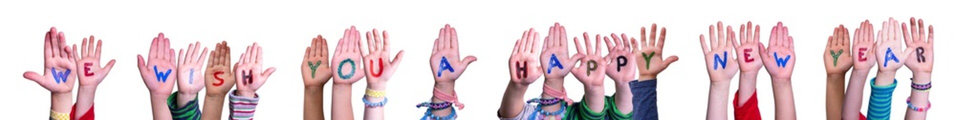 Children Hands Building Colorful English Word We Wish You A Happy New Year. White Isolated Background