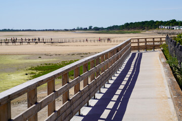 wooden path way access to public sand beach of Jard sur Mer in atlantic coast ocean France
