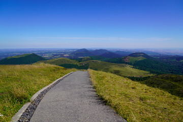 Fototapeta na wymiar path access top of the mountain to view valley Puy de Dôme volcano in Auvergne france