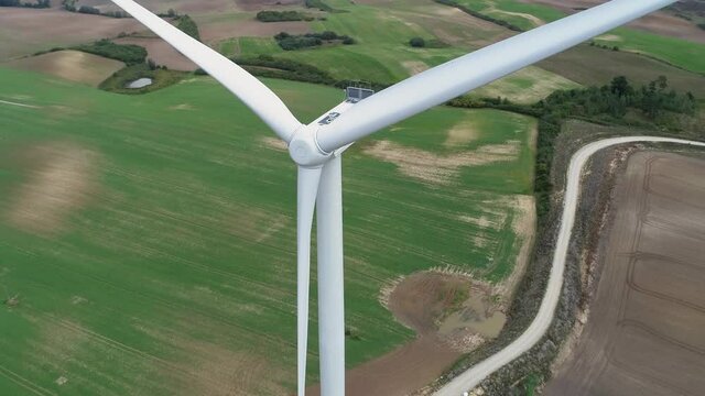 Wind Turbine Situated On The Rural Fields In The Countryside Of Kwidzyn, Poland. - aerial drone shot