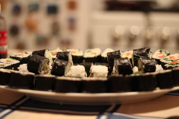 homemade japanese sushi rolls on the table